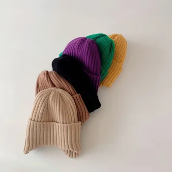 2021 karšto pardavimo duobę juostelės vaikų storio žiemą šilta megzta kepurė berniukams ir mergaitėms vientisos spalvos ausų apsaugos kepurės 52-54cm 2-6years